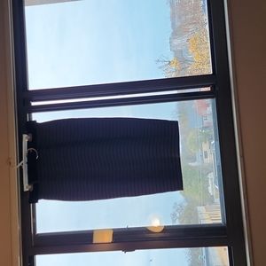 Black and gray straight belted skirt. Size extra large. Poly 95% span 5%